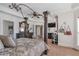 Large main bedroom featuring a canopy bed, tray ceiling, and ample closet space at 525 Waters Way, Fayetteville, GA 30215
