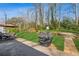 Beautiful backyard with lush lawn, patio, and barbecue grill for outdoor enjoyment at 731 Fern Se St, Marietta, GA 30067