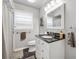 Modern bathroom featuring a sleek vanity, contemporary fixtures, and tiled flooring at 731 Fern Se St, Marietta, GA 30067
