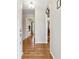 Bright entryway featuring hardwood floors, neutral paint, and views of a home office and dining room at 731 Fern Se St, Marietta, GA 30067