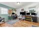 Bright office featuring multiple workstations, hardwood floors, and a large window at 731 Fern Se St, Marietta, GA 30067