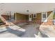 Expansive covered patio area perfect for outdoor entertaining and relaxation at 731 Fern Se St, Marietta, GA 30067