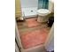 Bathroom featuring wood-look floors, a toilet, and coordinating pink bath mats at 4038 Se Clay Court Se Se, Conyers, GA 30013