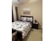 Cozy bedroom features a comfortable bed, stylish nightstand, and elegant decor for a relaxing retreat at 4038 Se Clay Court Se Se, Conyers, GA 30013