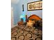 Comfortable bedroom boasts elegant bedding, complemented by stylish lamps and tasteful artwork for a cozy retreat at 4038 Se Clay Court Se Se, Conyers, GA 30013