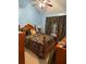 Bright bedroom with a ceiling fan, featuring a comfortable bed and stylish curtains for a cozy ambiance at 4038 Se Clay Court Se Se, Conyers, GA 30013