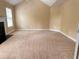 Spacious bedroom featuring neutral-toned walls, a fireplace, and a large window for ample natural light at 4038 Se Clay Court Se Se, Conyers, GA 30013