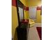 Bright bedroom featuring a comfortable bed, elegant dresser, and stylish yellow chair for a relaxing space at 4038 Se Clay Court Se Se, Conyers, GA 30013