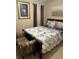 Charming bedroom with a floral bedding and matching seating area, offering a comfortable and stylish space at 4038 Se Clay Court Se Se, Conyers, GA 30013