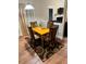 Bright dining nook with a modern light fixture and view of the fireplace at 4038 Se Clay Court Se Se, Conyers, GA 30013