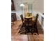 Bright dining nook with wood-look floors and a view of the upper level at 4038 Se Clay Court Se Se, Conyers, GA 30013