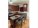 Cozy kitchen featuring granite countertops, stainless steel appliances, and a center island at 4038 Se Clay Court Se Se, Conyers, GA 30013