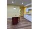 Bright kitchen with a granite-topped island and white cabinetry at 4038 Se Clay Court Se Se, Conyers, GA 30013