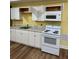 Bright kitchen with white cabinetry and countertops at 4038 Se Clay Court Se Se, Conyers, GA 30013