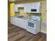 Kitchenette features modern appliances, granite counters, and ample cabinetry at 4038 Se Clay Court Se Se, Conyers, GA 30013