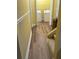 Hallway leading to laundry area with white washer and dryer at 4038 Se Clay Court Se Se, Conyers, GA 30013