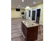 Open concept living room with bar and dining area at 4038 Se Clay Court Se Se, Conyers, GA 30013