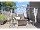 Backyard patio area features an outdoor living space with a decorative gazebo and comfortable seating at 5884 Grande River Rd, Atlanta, GA 30349