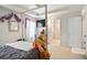 Relaxing bedroom with tray ceilings, a TV, and plenty of space for rest and rejuvenation at 5884 Grande River Rd, Atlanta, GA 30349