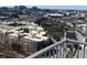 High angle of a residential area with roads and a lake in the background at 361 17Th Nw St # 1717, Atlanta, GA 30363