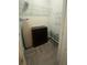 Walk in closet with storage shelf, shoe rack, and ironing board at 361 17Th Nw St # 1717, Atlanta, GA 30363