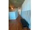 Hardwood floored hallway with view of doorway and decorative trim at 361 17Th Nw St # 1717, Atlanta, GA 30363