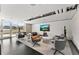 Spacious common lounge area with modern furniture, TV, and a relaxing ambiance at 361 17Th Nw St # 1717, Atlanta, GA 30363