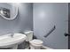 Cozy half bath featuring a pedestal sink and neutral decor at 12 Windcrest, Covington, GA 30016