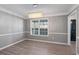 Elegant dining room showcasing a stylish chandelier and neutral color palette at 12 Windcrest, Covington, GA 30016