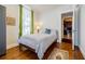 Bright bedroom with hardwood floors offers easy kitchen access at 198 Ponce De Leon Ne Ave # 5D, Atlanta, GA 30308