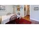Hardwood floors in the dining area and a glimpse into the kitchen and hallway at 198 Ponce De Leon Ne Ave # 5D, Atlanta, GA 30308