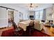 Bright living room featuring hardwood floors, a ceiling fan, and a comfortable seating area at 198 Ponce De Leon Ne Ave # 5D, Atlanta, GA 30308