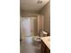 Bathroom features a toilet, tub with shower, and vanity with updated counter top at 2820 Skye Ter, Duluth, GA 30096