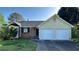 Charming single-story home with a two-car garage and a well-maintained lawn at 2820 Skye Ter, Duluth, GA 30096