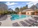 Inviting community pool area with plenty of lounge chairs, perfect for relaxing on sunny days at 330 Meadowcrest Cir, Canton, GA 30115