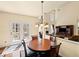 Cozy dining area adjacent to living room with access to backyard deck at 330 Meadowcrest Cir, Canton, GA 30115
