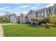Inviting two-story house with landscaped front yard, brick facade, and two-car garage at 330 Meadowcrest Cir, Canton, GA 30115