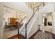 Grand foyer with a staircase, hardwood floors, and an elegant chandelier at 330 Meadowcrest Cir, Canton, GA 30115