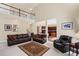 Spacious living room with high ceilings, leather sofas, and an open layout at 330 Meadowcrest Cir, Canton, GA 30115