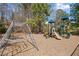 Community playground with monkey bars, play structures, and a soft mulch surface at 330 Meadowcrest Cir, Canton, GA 30115