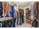 Spacious walk-in closet with ample hanging space and shelving for organized storage at 330 Meadowcrest Cir, Canton, GA 30115