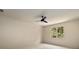 Bedroom with neutral walls, plush carpeting, and ceiling fan at 6055 Tattnall Overlook, Acworth, GA 30101