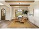 Bright dining area featuring wood floors, modern lighting, and wood beams at 6055 Tattnall Overlook, Acworth, GA 30101