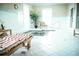 Tranquil spa room with a plunge pool, lounge chairs, and serene ambiance at 6055 Tattnall Overlook, Acworth, GA 30101