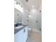 Modern bathroom featuring a glass shower, black fixtures, and white vanity with a gray countertop at 64 Telfair Ct, Acworth, GA 30101