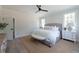 Spacious bedroom with neutral walls, a cozy rug, and natural light at 64 Telfair Ct, Acworth, GA 30101