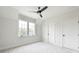 Bedroom featuring a ceiling fan and a large window for natural light at 64 Telfair Ct, Acworth, GA 30101