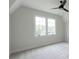 Bedroom featuring a ceiling fan and a large window for natural light at 64 Telfair Ct, Acworth, GA 30101