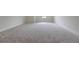 Bright bedroom with neutral carpet and white trim at 64 Telfair Ct, Acworth, GA 30101