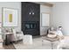Chic living room featuring a modern fireplace, comfortable seating, and natural light at 64 Telfair Ct, Acworth, GA 30101